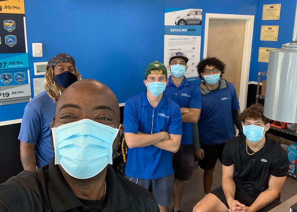 International Auto Spa employees with masks